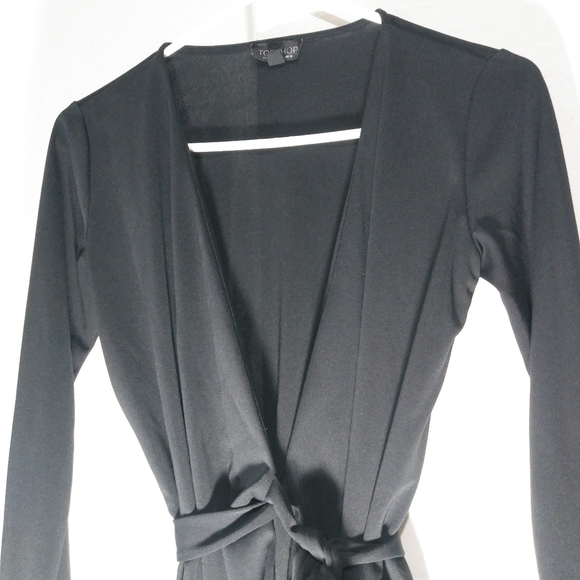 Topshop Tops - Topshop wrap Top long sleeves 
Size 4
